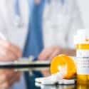 Doctor Writing Prescription and Dosage | Burt's Pharmacy and Compounding Lab
